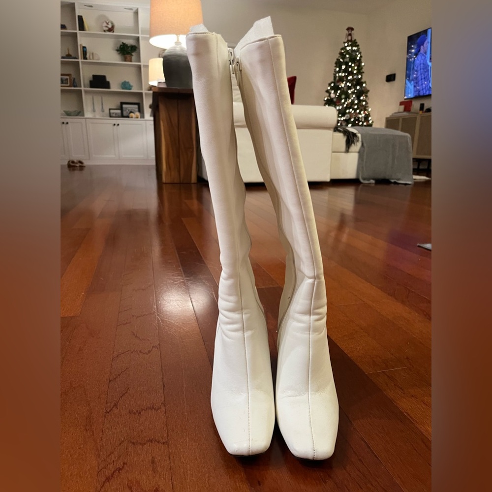 White knee high boots